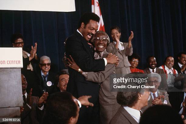 One year before the 1984 presidential election, Baptist minister and civil rights activist Jesse Jackson hugs former New York congresswoman Shirely...