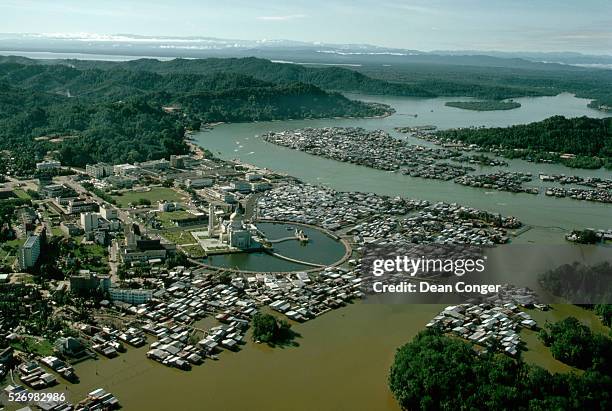 The pile dwellings of Kampng Ayer surround the Omar Ali Saifuddin Mosque, in the Brunei capital of Bandar Seri Begawan.