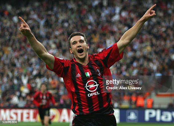 Andriy Shevchenko of AC Milan celebrates scoring the first goal during the UEFA Champions League semi-final first leg match between AC Milan and PSV...