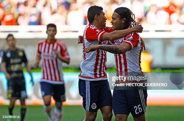 Carlos Salcedo and Carlos Pena of Guadalajara celebrate after scoring against Dorados during their Mexican Clausura 2016 tournament football match at...