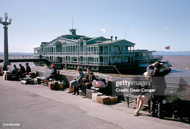 Passengers Wait on the Quayside at an Amur River Port