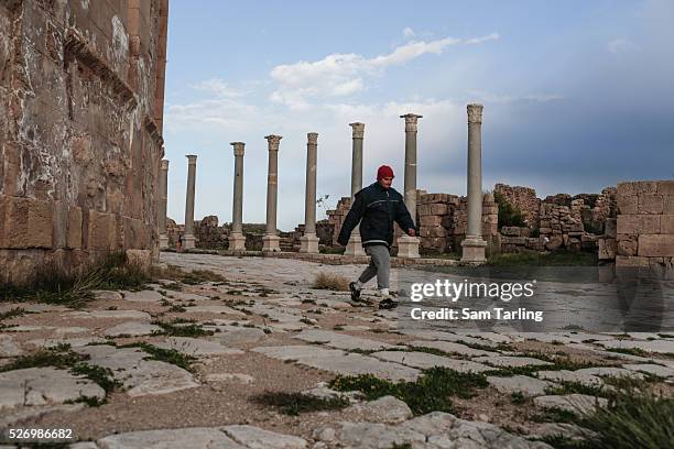 Outside the ruins of the theatre at the Leptis Magna historical site, near Tripoli, Libya, on March 10, 2015.