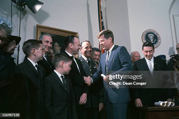President John F. Kennedy shakes hands and meets officials involved in the X-15 rocket plane project at the awarding of the Harmon International...