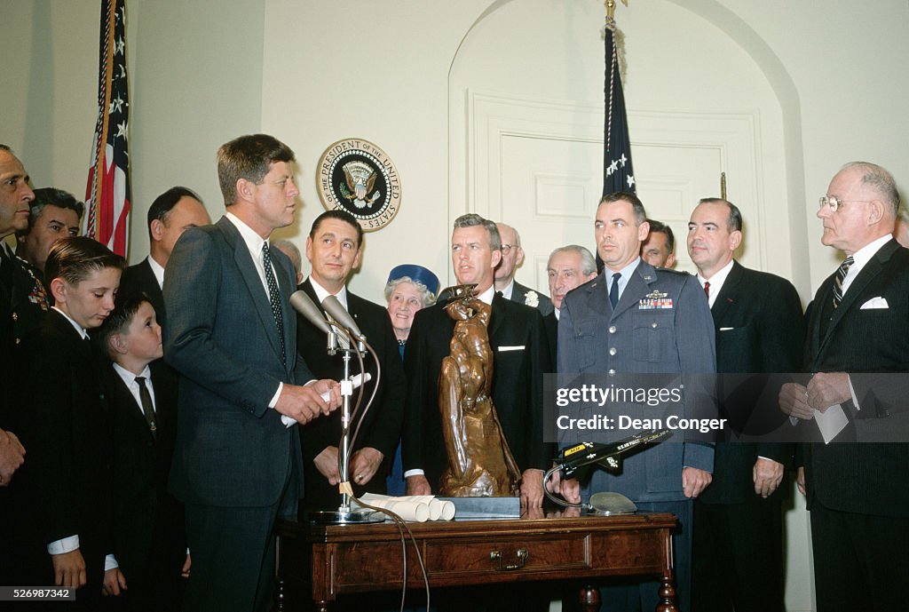 President Kennedy Awarding Trophy to NASA