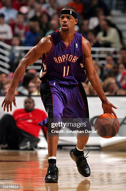 Rafer Alston of the Toronto Raptors drives against the Chicago Bulls during the game at the United Center on April 9, 2005 in Chicago, Illinois. The...