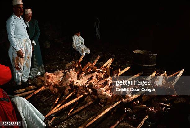 Samaritans gather on Mount Gerizim in the spring at Passover to slay lambs and roast them over a fire as an offering to God. Near Nabulus, Samaria,...