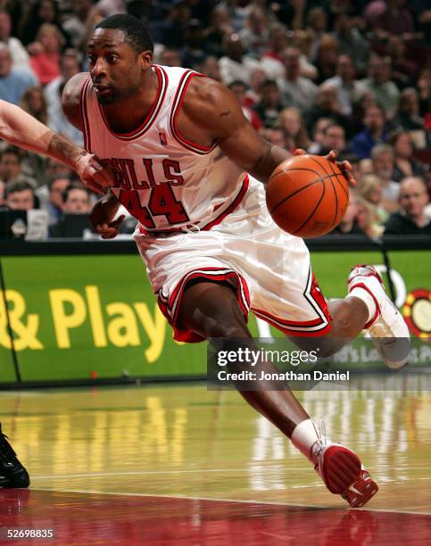 Adrian Griffin of the Chicago Bulls drives against the Toronto Raptors during the game at the United Center on April 9, 2005 in Chicago, Illinois....