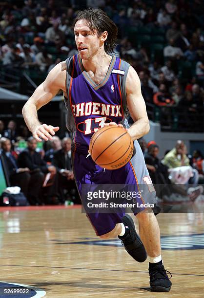 Steve Nash of the Phoenix Suns drives to the basket against the Charlotte Bobcats during their game on March 23, 2005 at the Charlotte Coliseum in...