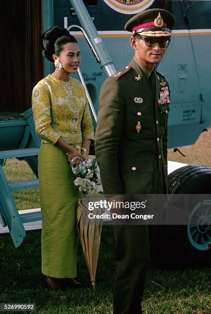 King Rama IX and Queen Sirikit have arrived to visit the victims of a recent flood in Hat Yai, Thailand.