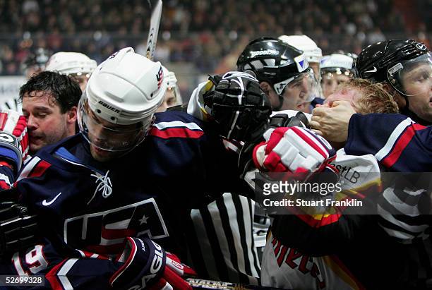 Daniel Kreutzer of Germany scuffles with David Legwand of USA during The International Friendly Ice Hockey match between Germany and USA at The...