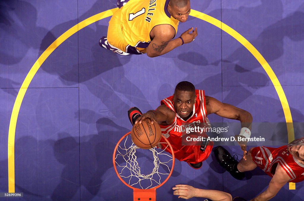 Mutombo Rockets Dikembe Mutombo of the Houston Rockets dunks during the game against ...