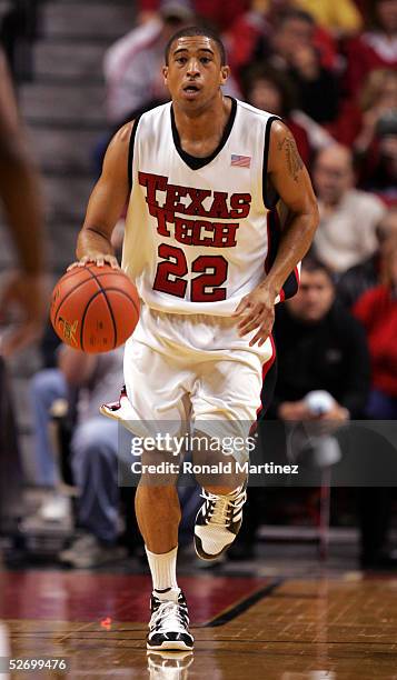 Jarrius Jackson of the Texas Tech Raiders brings the ball upcourt during the game against the Oklahoma State Cowboys on January 8, 2005 at the United...