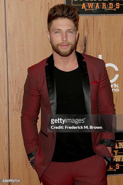 Singer Chris Lane poses in the press room during the 2016 American Country Countdown Awards at The Forum on May 1, 2016 in Inglewood, California.