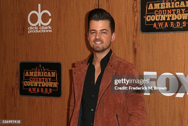 Singer Chase Bryant poses in the press room during the 2016 American Country Countdown Awards at The Forum on May 1, 2016 in Inglewood, California.