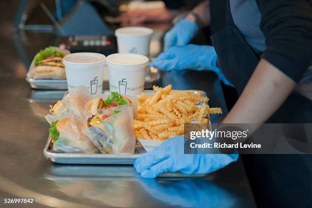 Orders to be picked up at the grand opening of the Shake Shack in Downtown Brooklyn in New York on Tuesday, December 20 2011. Shake Shack reported...