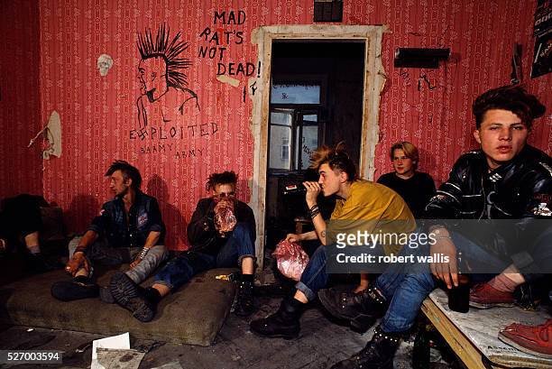 Russian punks living in abandoned building next to Pushkin Square, where they survive off of Pizza Hut and McDonald's garbage bins and panhandling.