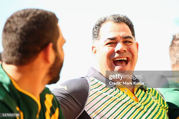 Kangaroos coach Mal Meninga shares a laugh with Greg Inglis during the Australia Kangaroos Test team photo session at Crowne Plaza Coogee on May 2,...