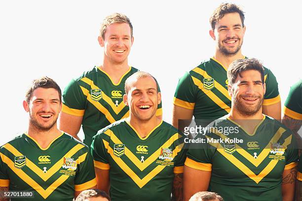 Matt Gillett, Michael Morgan, Blake Ferguson, Aidan Guerra and James Tamou share a joke as they pose for the team photo during the Australia...
