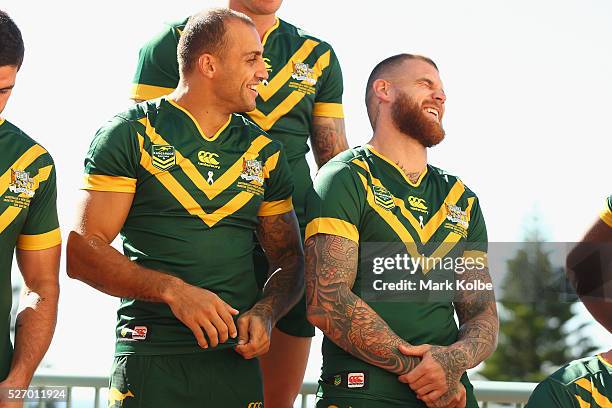 Blake Ferguson and Josh Dugan share a joke as they pose for the team photo during the Australia Kangaroos Test team photo session at Crowne Plaza...