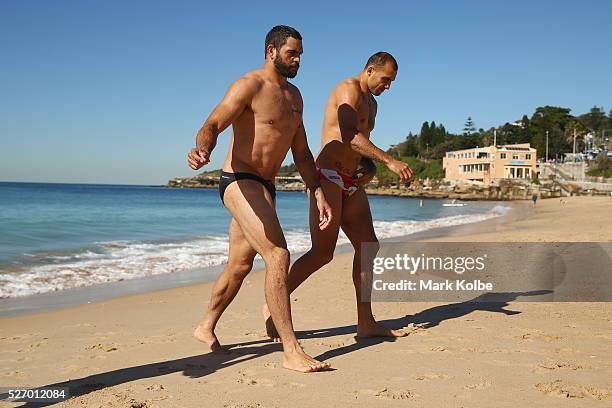 Greg Inglis and Blake Ferguson leave the water during the Australia Kangaroos Test team recovery session at Coogee Beach on May 2, 2016 in Sydney,...