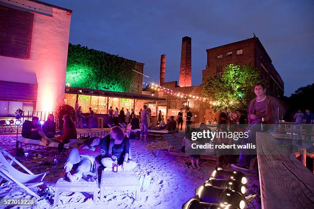 The Arena Club in Berlin, part of a large former factory area on the banks of the River Spree now converted into artists studios, performances...