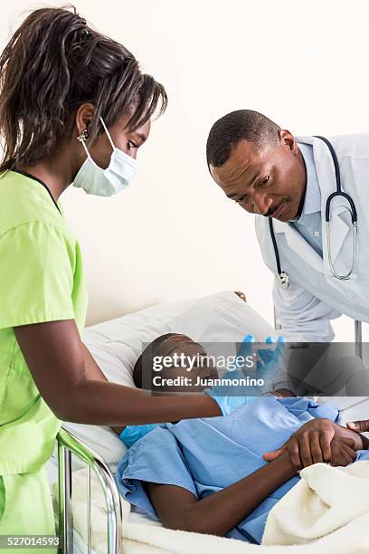 fear of needles - ebola hospital stock pictures, royalty-free photos & images