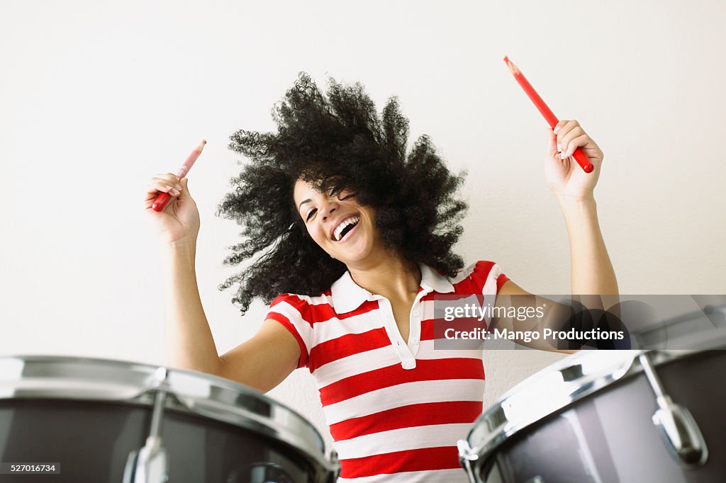 Woman Playing Drums