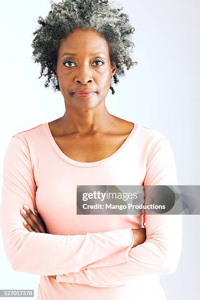 unhappy woman - african american woman serious stock pictures, royalty-free photos & images