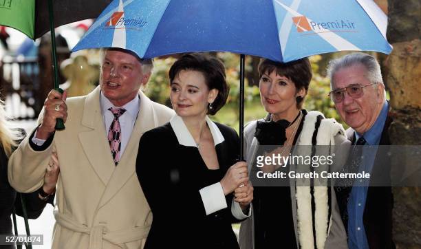 Wife of British Prime Minister Tony Blair, Cherie Blair , and unidentified guests attend the funeral service held for actor Sir John Mills on April...