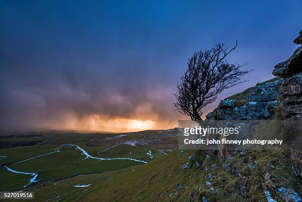 twistleton scar, incoming squall line. yorkshire dales. uk. - squall stock pictures, royalty-free photos & images