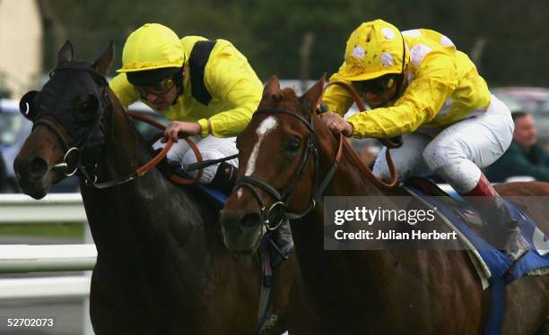 Frankie Dettori and Andronikos get the better of the Ted Durcan ridden Yajbill to land The Hesbonds Stud Pavilion Stakes Race run at Lingfield Park...