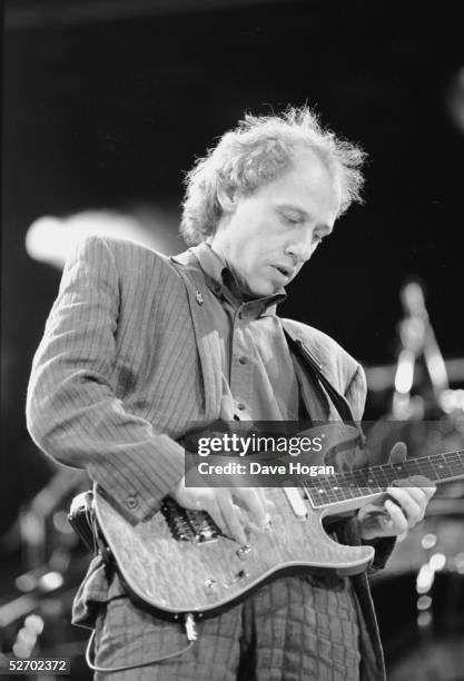 English singer and guitarist Mark Knopfler of Dire Straits, performing at the 70th birthday tribute concert for imprisoned South African leader...