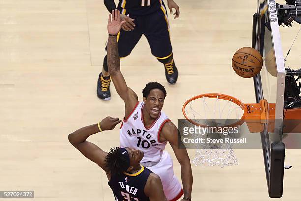 Toronto Raptors guard DeMar DeRozan scores over Indiana Pacers forward Myles Turner. Toronto Raptors play Indiana Pacers in game seven of the opening...
