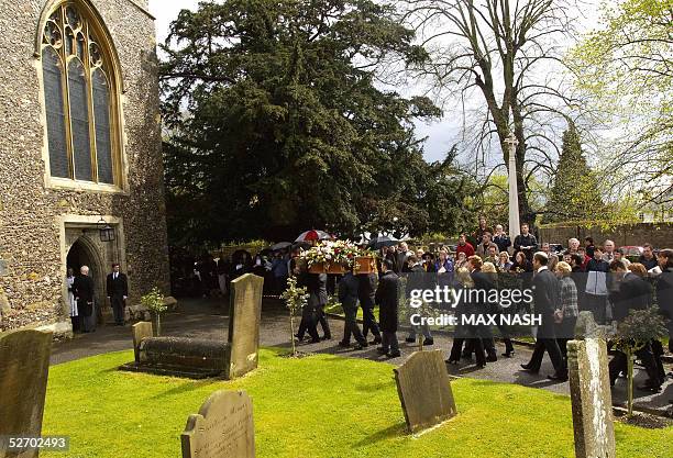 Actor Sir John Mills' coffin is carried inside the church of St. Mary The Virgin for his funeral service, 27 April 2005 in Denham. AFP PHOTO/Max Nash