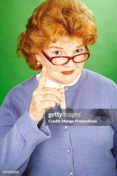 redheaded woman shaking finger - shaking finger stock pictures, royalty-free photos & images