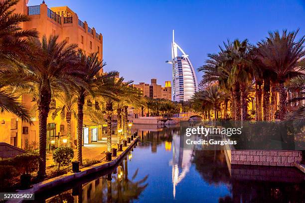 burj al arab at dusk, dubai, uae - burj al arab night stock pictures, royalty-free photos & images