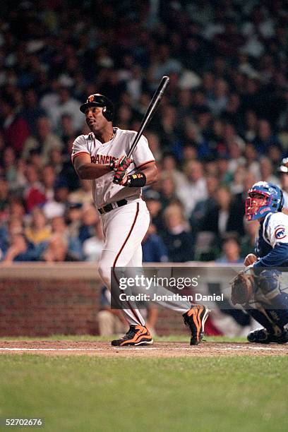 Joe Carter of the San Francisco Giants swings at the pitch during the game against the Chicago Cubs at Wrigley Field on September 28, 1998 in...