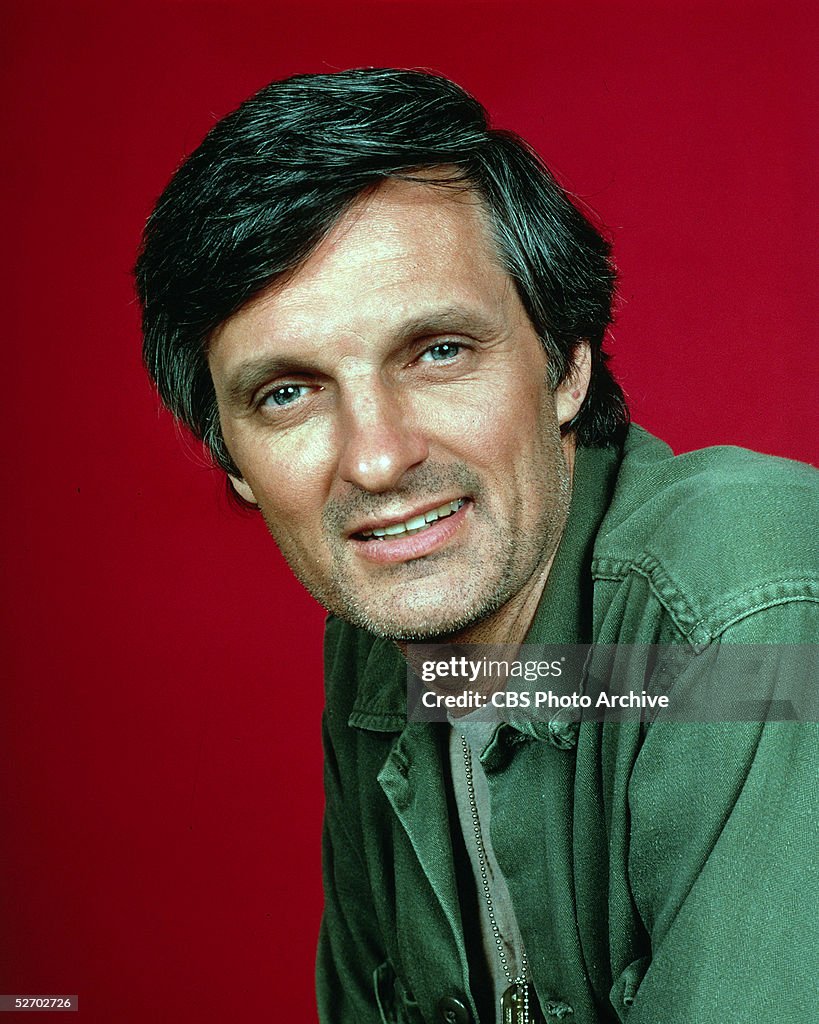 Studio portrait of American actor Alan Alda in character as Army