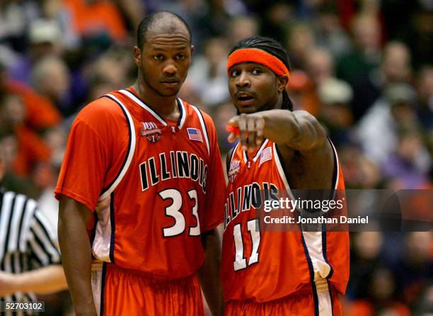 Dee Brown talks to Rich McBride of the University of Illinois Fighting Illini during a game against the Northwestern University Wildcats on January...