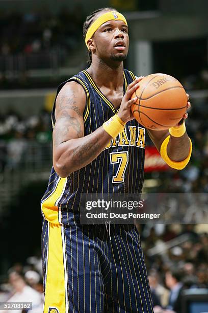 Jermaine O'Neal of the Indiana Pacers shoots a free throw against the Washington Wizards during the NBA game on February 7, 2005 at the MCI Center in...