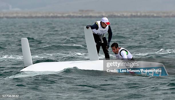 Olympics Sailing Weymouth Mens 49er Class Skiff Germanys Tobias Schadewaldt and Hannes Baumann capsize during the fleet race