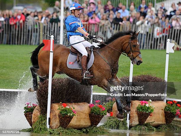 French equestrian Nicolas Touzaint competes on Hildago de L'ile at the lake to win the 2008 Mitsubishi Motors Badminton Horse Trials in Badminton...