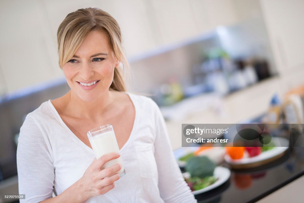 Woman with a glass of milk