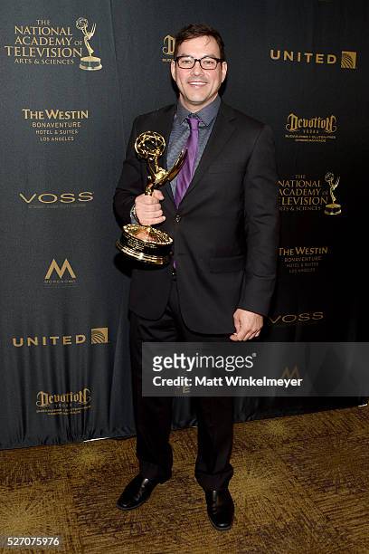 Actor Tyler Christopher poses in the press room with his Emmy for Outstanding Lead Actor in a Drama Series at the 43rd Annual Daytime Emmy Awards at...