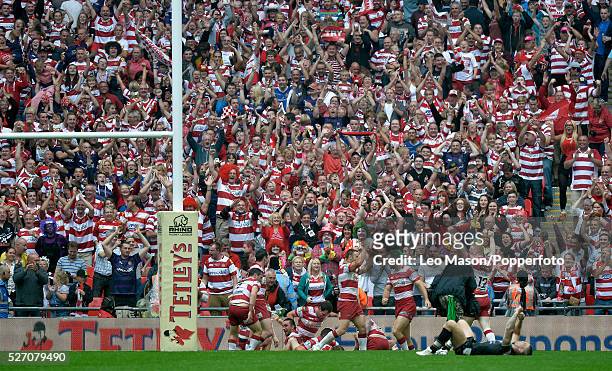 Tetleys Challenge Rugby League Final Wembley Stadium UK Hull FC v Wigan Warriers Wigan celebrating their second try in front of own supporters