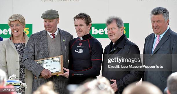 Jockey Tony McCoy pictured in centre with, from left, Clare Balding, businessman Trevor Hemmings, J P McManus and trainer Paul Nicholls after his...