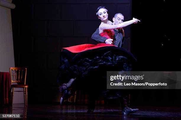 Matthew Bourne's SWAN LAKE performed at Sadlers Well Theatre London UK The Stranger Duet/Tango The Swan Jonathan Olivier The Queen Michela Mezazza