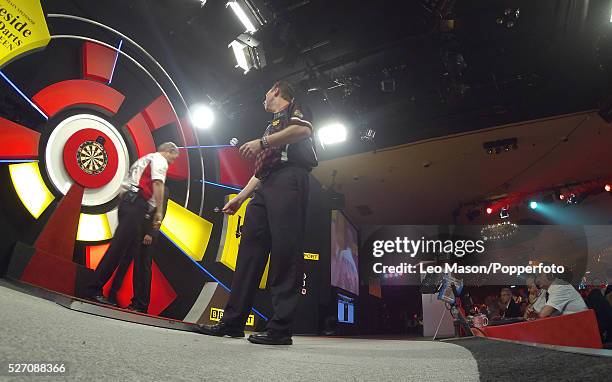 World Professional Darts Championships Lakeside Country Club Frimley Green UK Ist round action David Cameron CAN v Martin Adams ENG