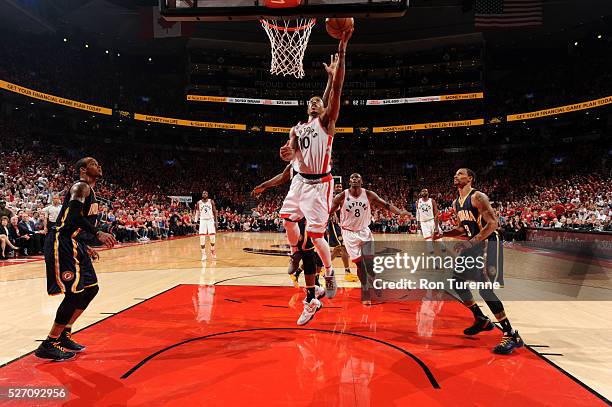 DeMar DeRozan of the Toronto Raptors goes to the basket against the Indiana Pacers in Game Seven of the Eastern Conference Quarterfinals during the...