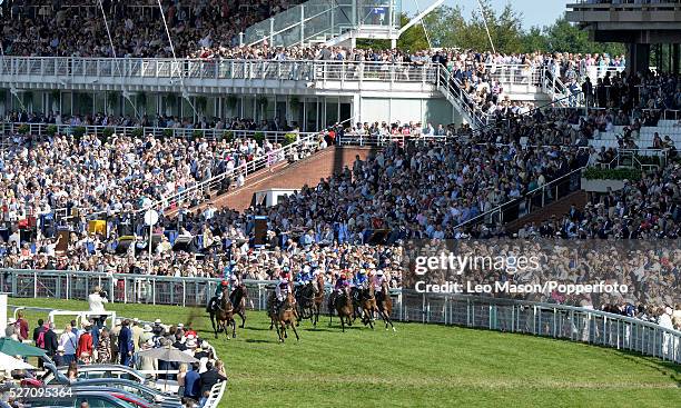 View of horses and riders nearing the finish of the L'Ormarins Queens Plate Stakes at the Qatar Goodwood Festival at Goodwood racecourse in West...